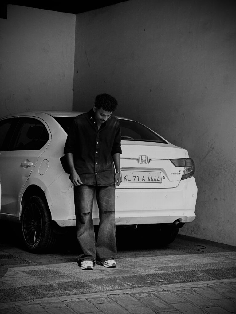 A man with white car and Freelance Digital Marketer in Kerala